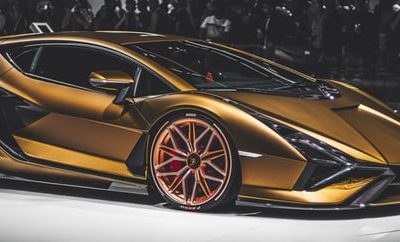 What are the benefits of going to a luxury car show?